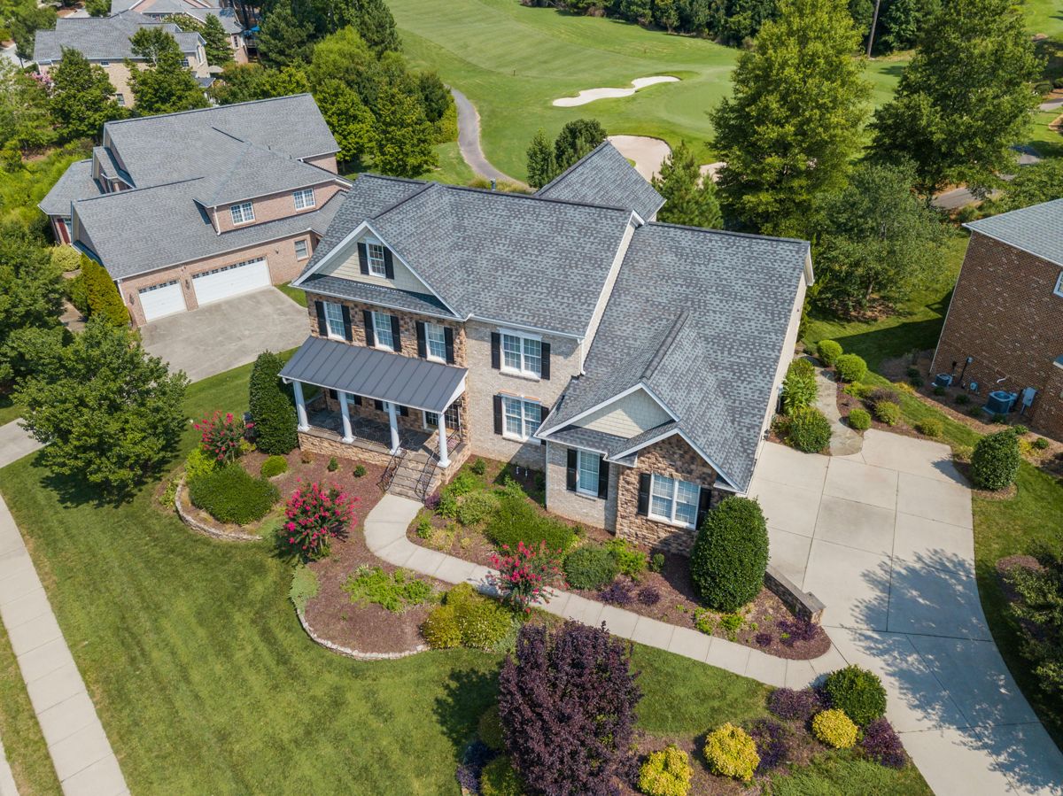 Brick and stone home on a golf course